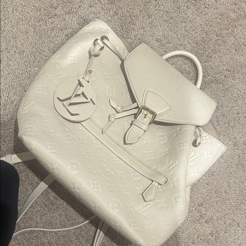 Louis Vuitton Cream Embossed Monogram Backpack